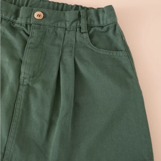 minifalda tablas tinte musgo, mi canesu, invierno 2025, moda infantil española